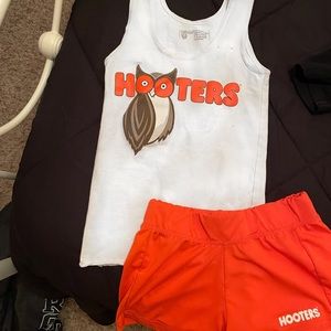 Hooters girl orange and white employee uniform